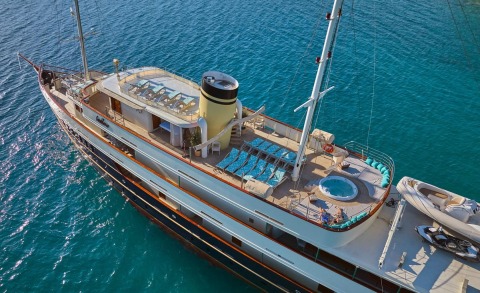 Top-down view of Casablanca luxury yacht deck with sun loungers and jacuzzi