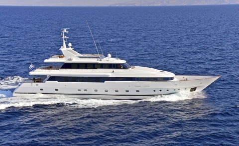 O'Rion luxury motor yacht cruising blue sea with streamlined white hull and multiple decks