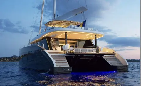 Above & Beyond luxury gulet yacht at sunset, calm blue sea and deck