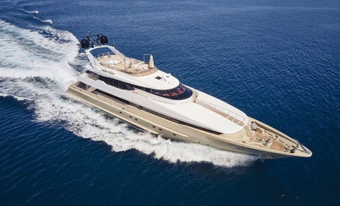 Daloli yacht speeding through open sea on luxury motor yacht