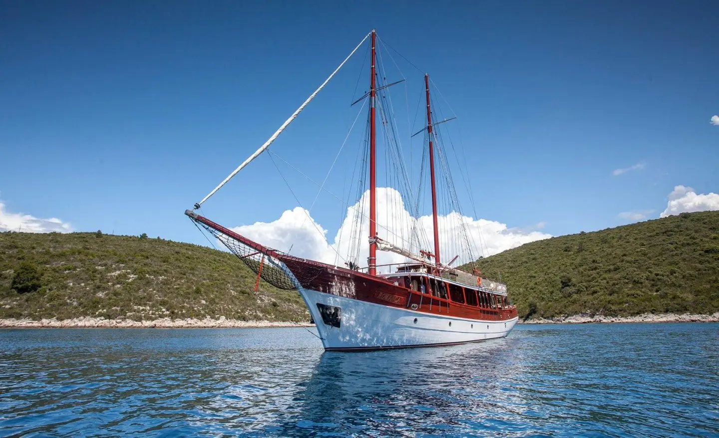 Romanca luxury gulet anchored in calm blue water at sunset