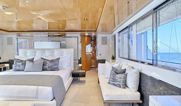 La Pellegrina 1 yacht master cabin with king bed, ensuite, light wood tones