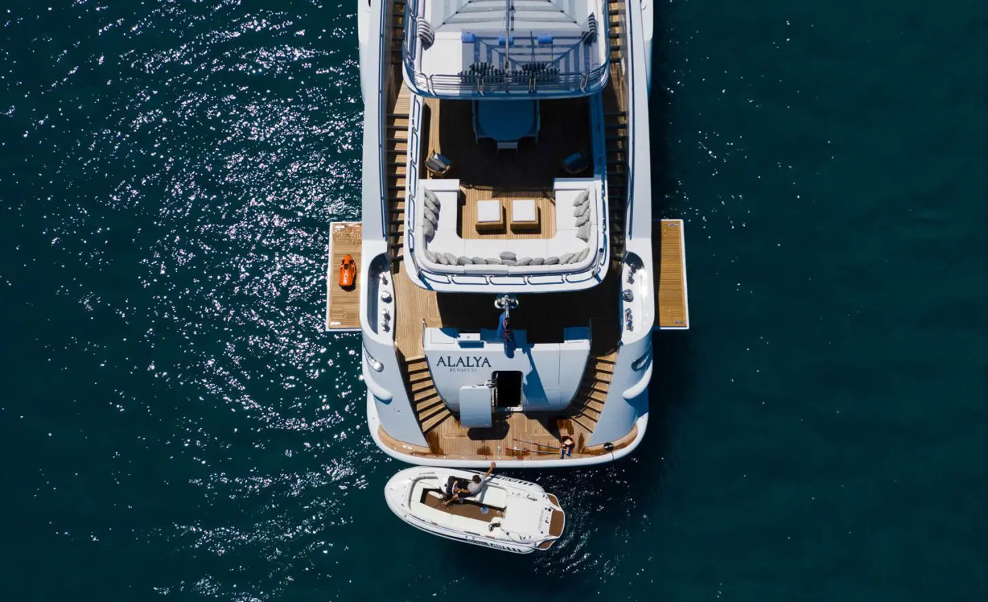 Aerial view of Alalya yacht anchored with a smaller tender nearby on deep blue sea