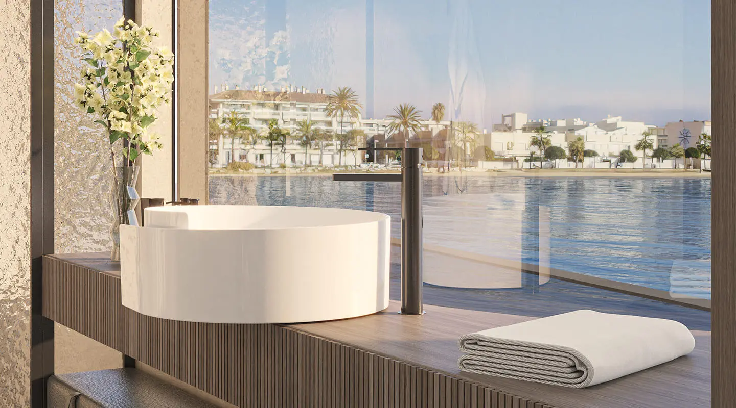 Bello luxury yacht bathroom with round freestanding tub and ocean view