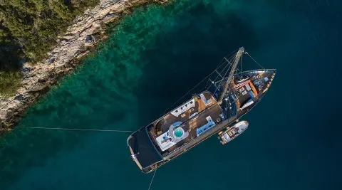 Aerial view of the Rara Avis gulet sailing yacht on blue water