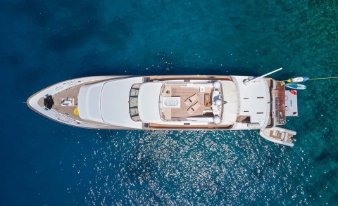 Overhead view of Idylle yacht with open deck and sunlit upper cockpit at sunset