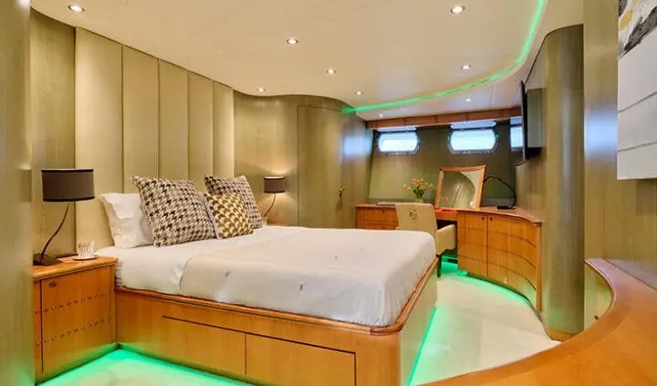 Mobius yacht master cabin with king bed, ensuite, soft lighting, neutral decor