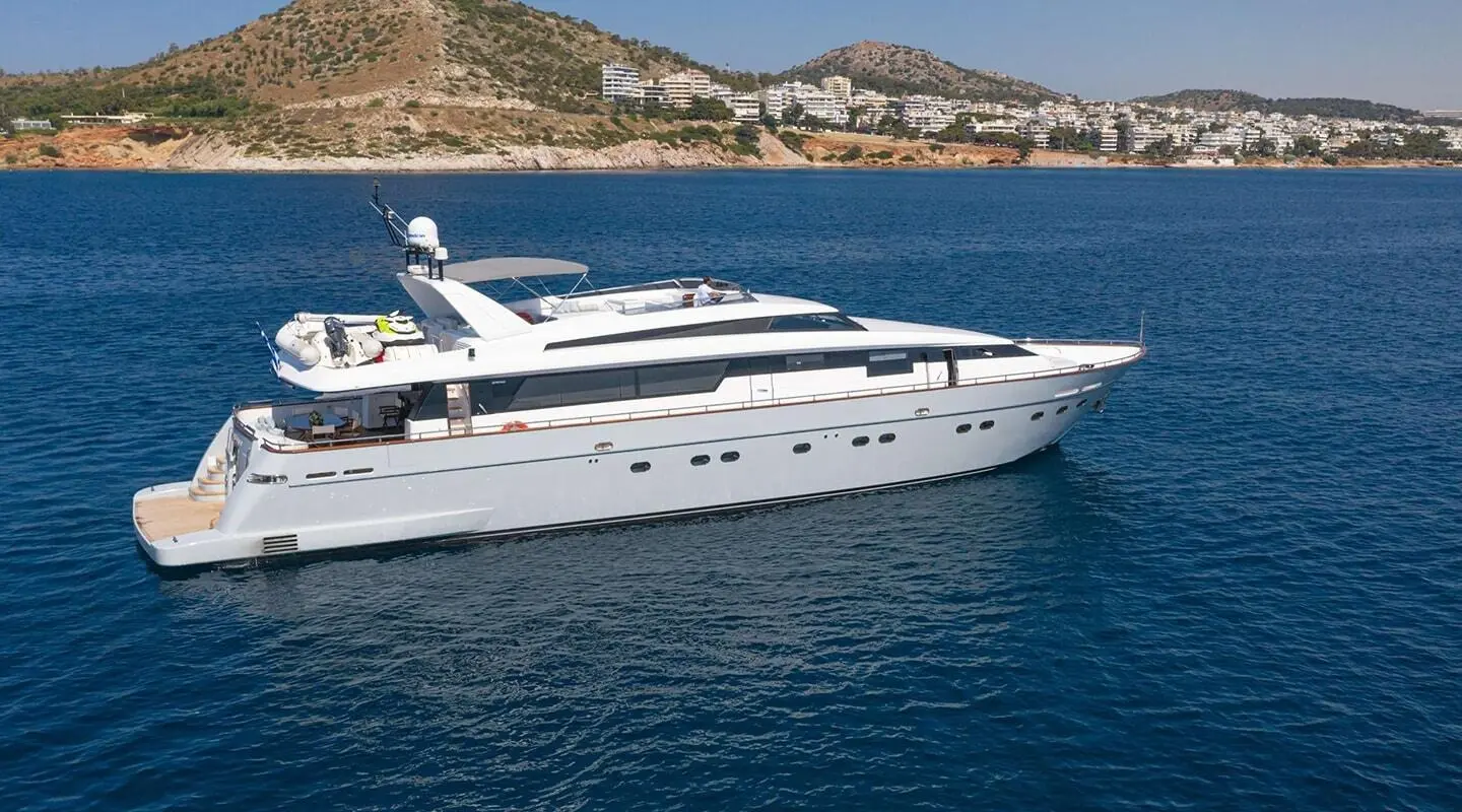 Grace yacht anchored in calm blue water with a white hull and deck