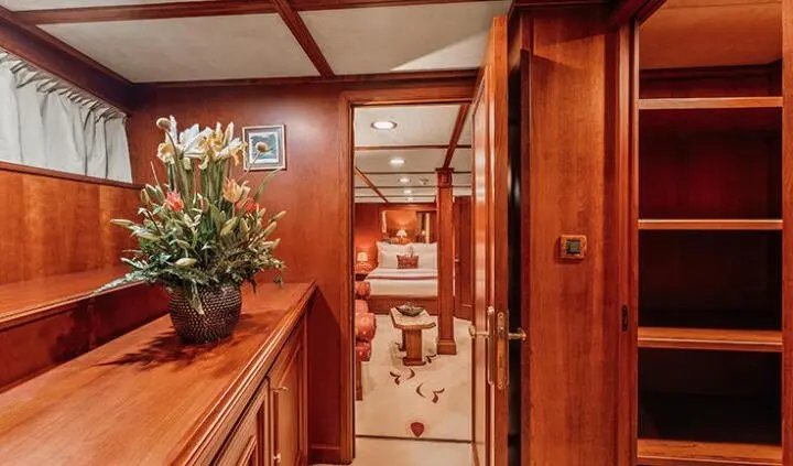 Seagull II master cabin with king bed and ensuite seen from doorway