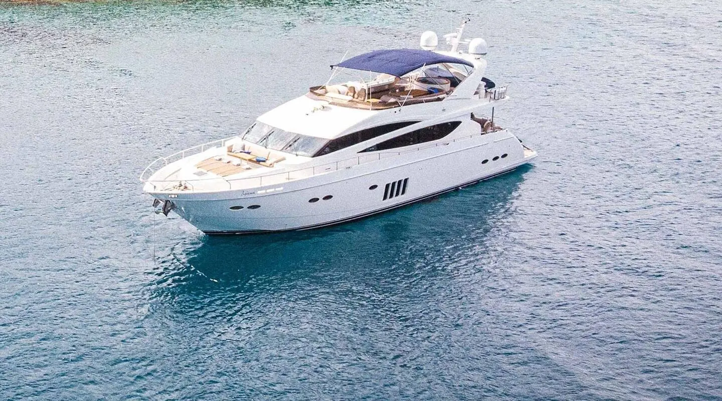White motor yacht Insieme seen from the open deck with upper leisure area