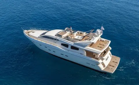 Aerial view of Amoraki luxury motor yacht cruising blue sea, white hull