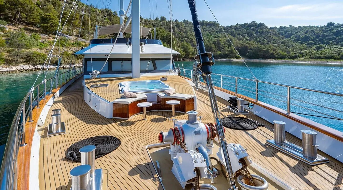 Navilux motor yacht on the forward deck with ropes, deck fittings and calm blue water