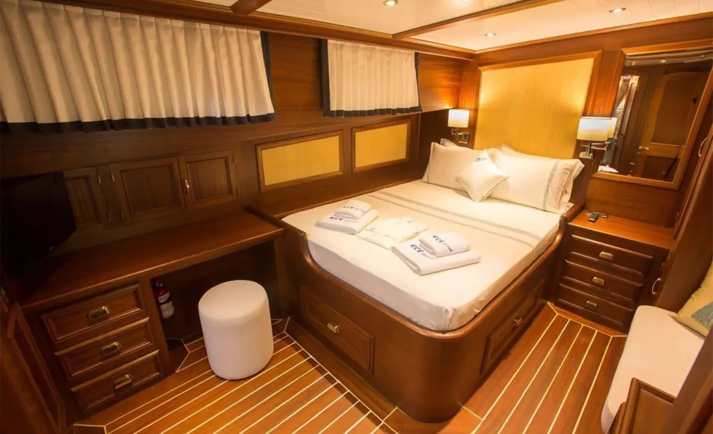 Interior of Ece Berrak gulet with double cabin, bed, wooden fittings