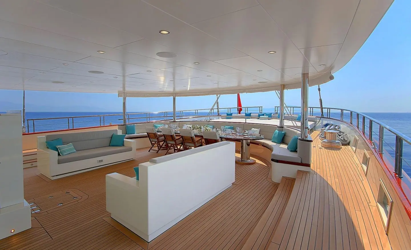 Meira motor yacht aft deck with seating area and ocean view.