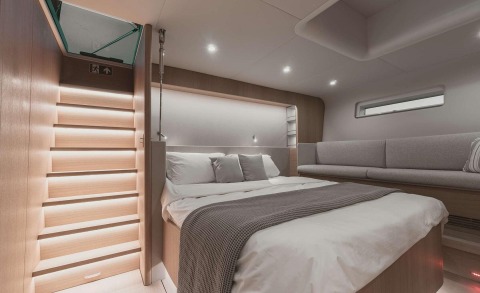 Nadamas yacht bed with a sofa in a luxurious interior