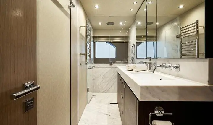 Master cabin with king bed, ensuite, wood accents, large windows and seating