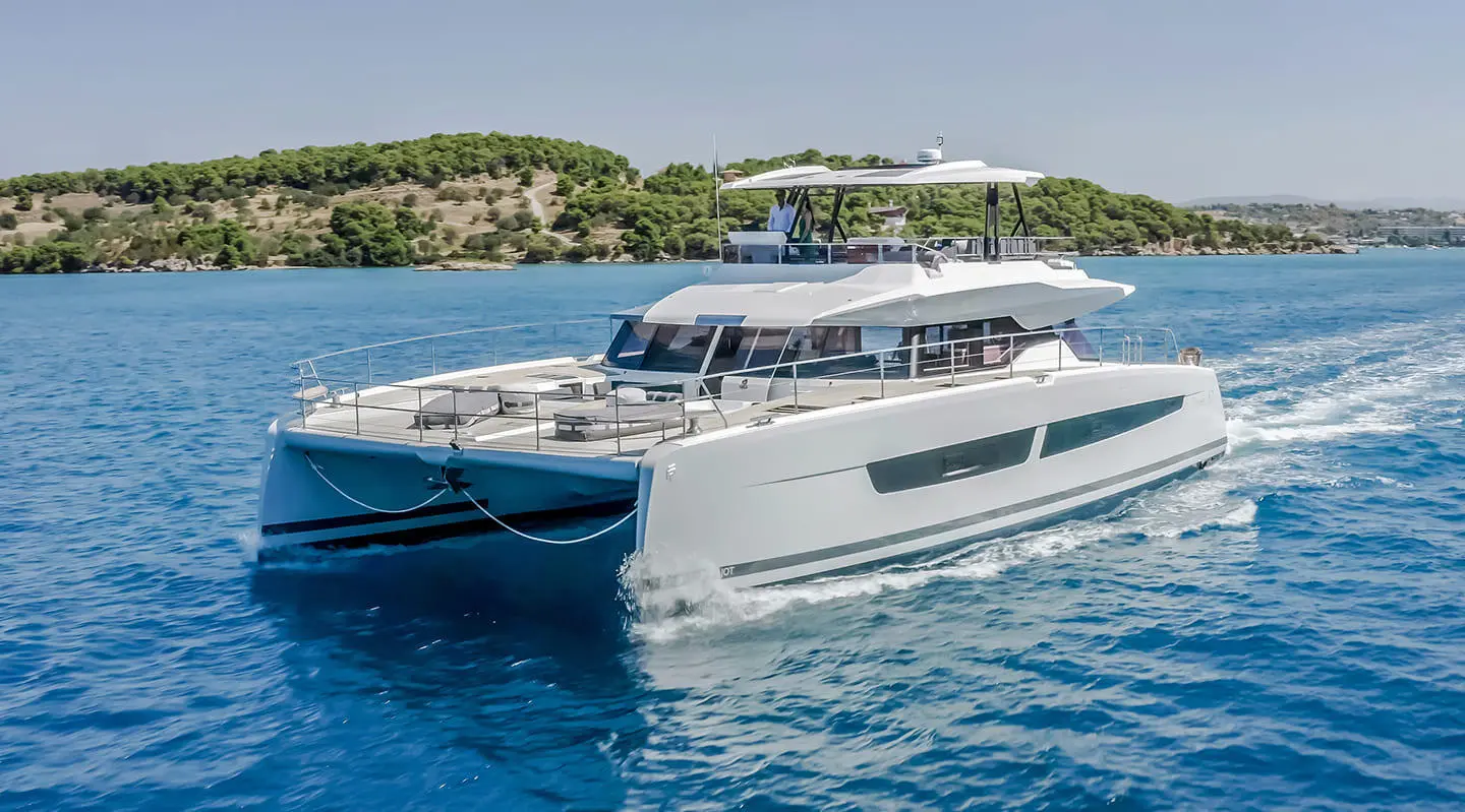 D2 luxury yacht cruising on calm blue water with white superstructure