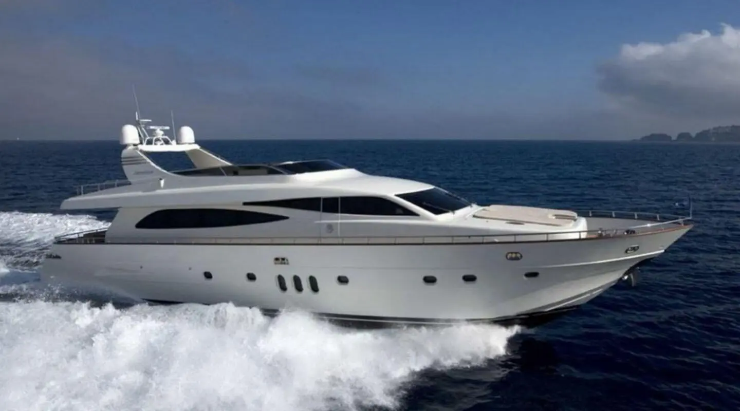 White motor yacht Miraval cruising fast on open sea