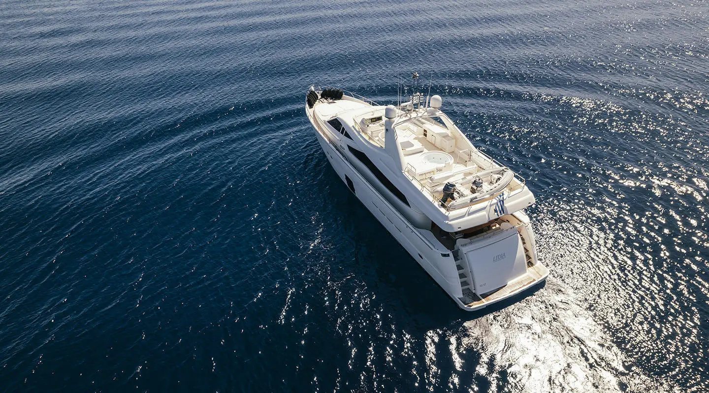 White motor yacht Lidia seen from above with upper deck and stern