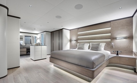 All About U 2 luxury yacht cabin interior with plush bed and modern wood paneling