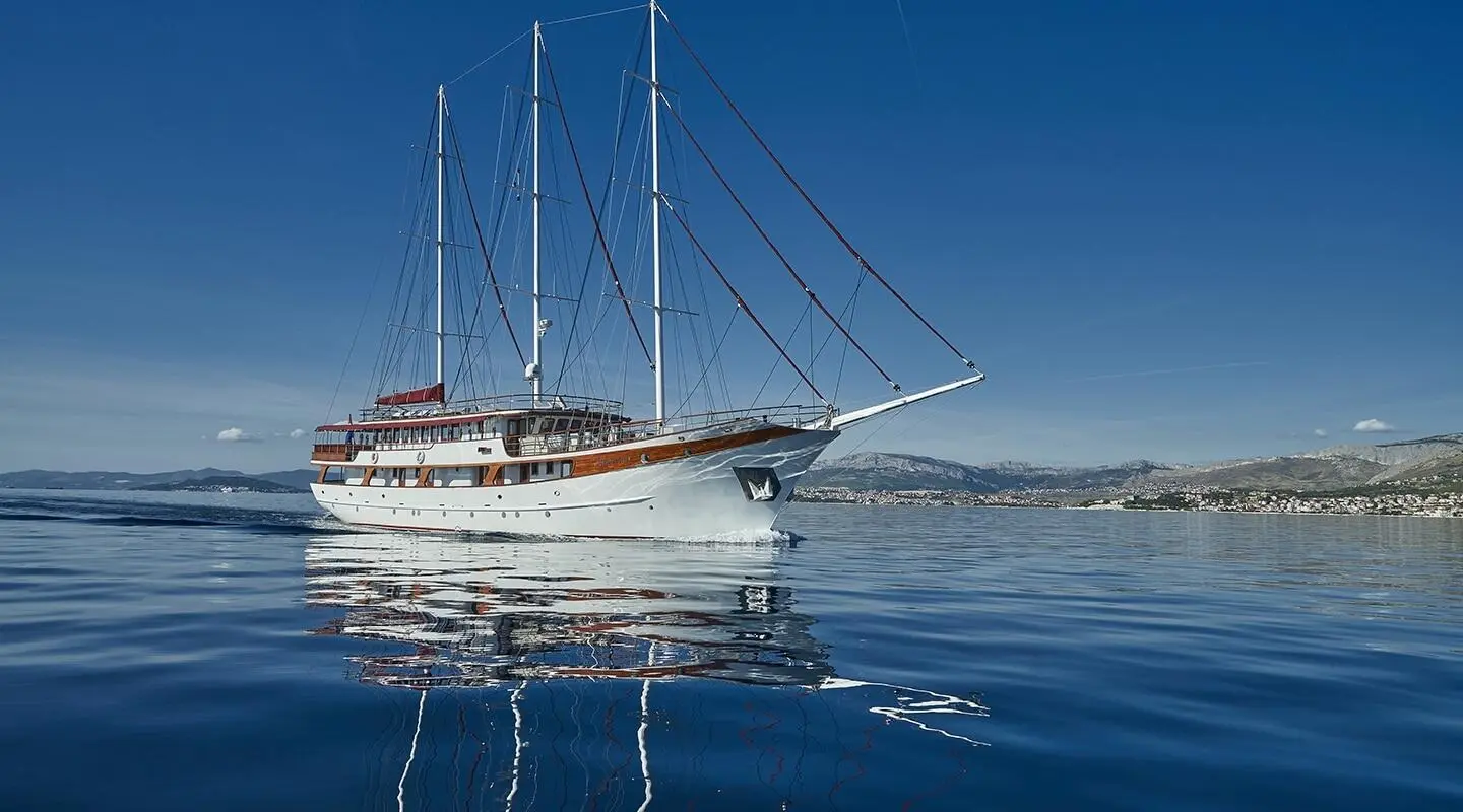 Amorena luxury sailing yacht on calm blue sea with clear sky