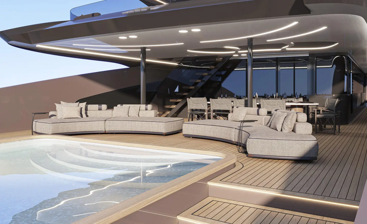 Yacht Bello pool area with lounge chairs on deck under shaded cover