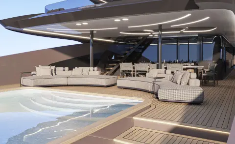 Yacht Bello pool area with lounge chairs on deck under shaded cover