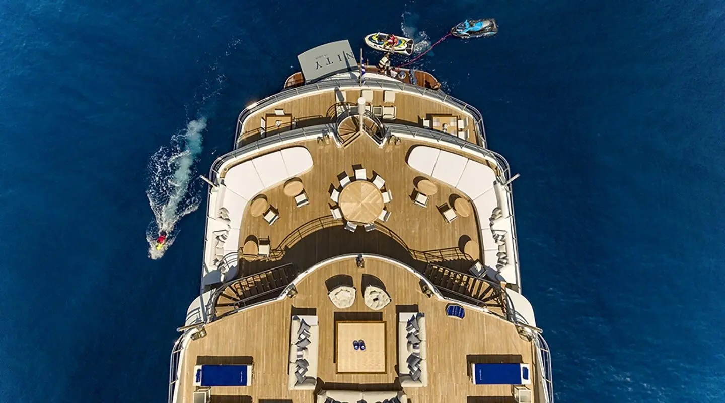 Top-down view of Marquise luxury motor yacht at sea during sunset