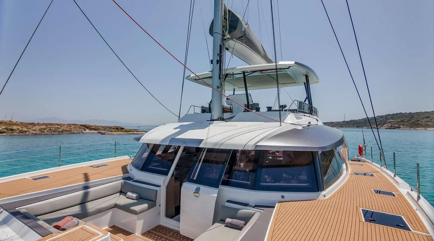 Astoria yacht at dock with open deck stairs and moored lines