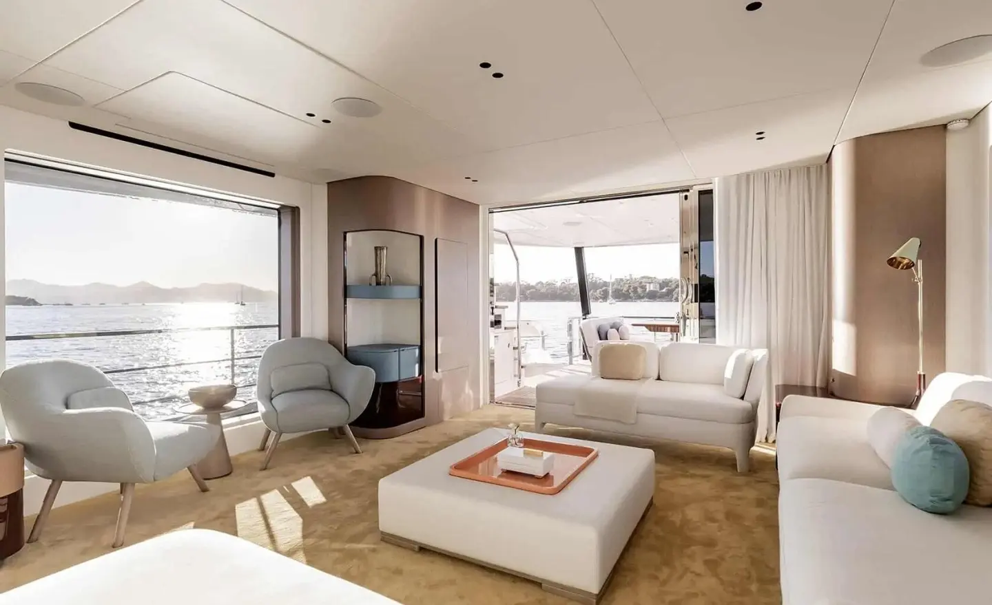 Viva II saloon interior: seating area with coffee table and large windows