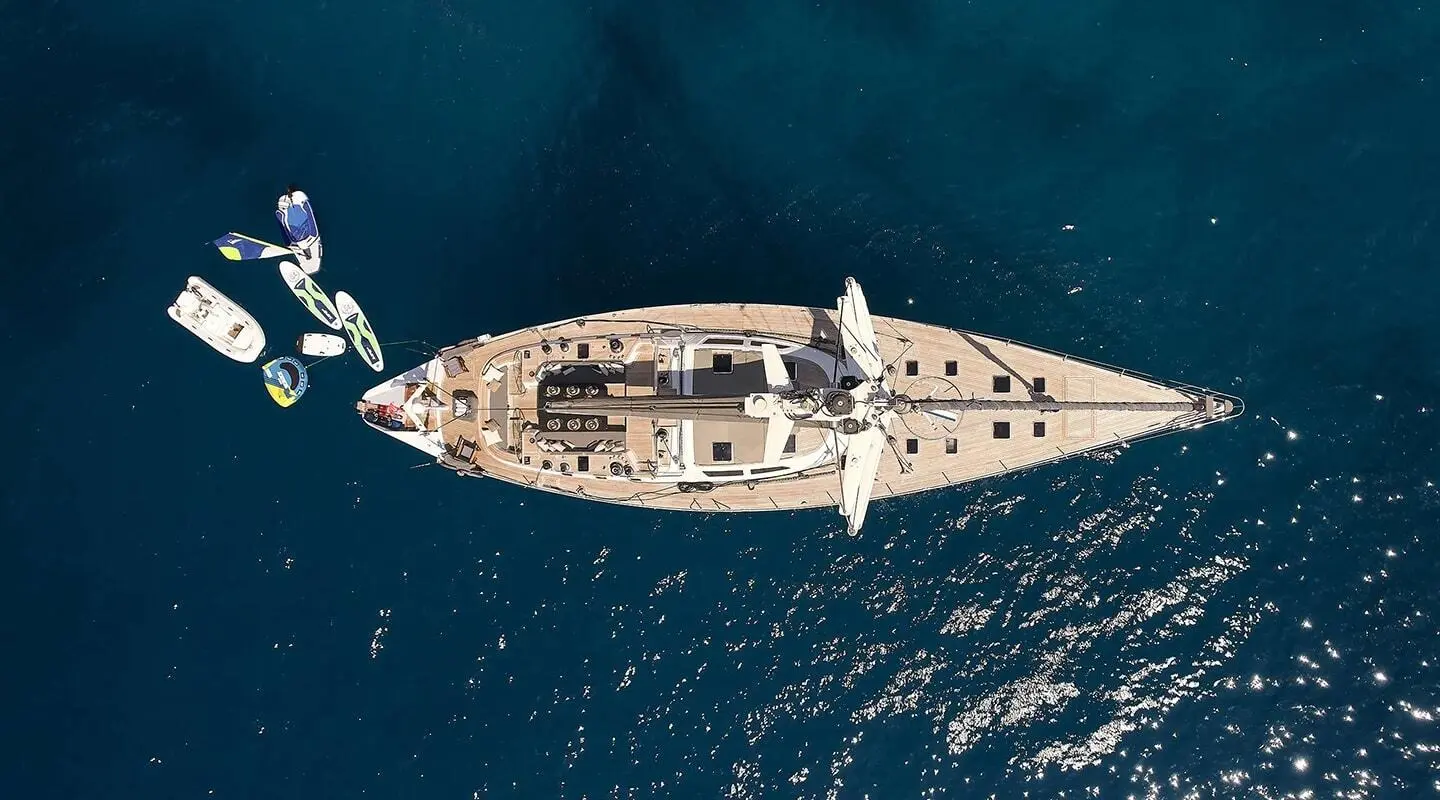 Aizu luxury yacht seen from above, sailing on calm deep blue water