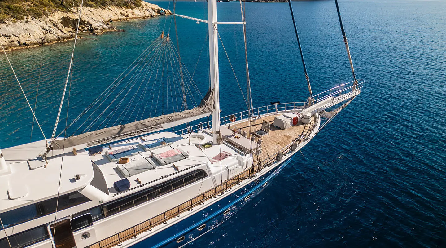 Esma Sultan gulet sun deck with sun loungers and rigging