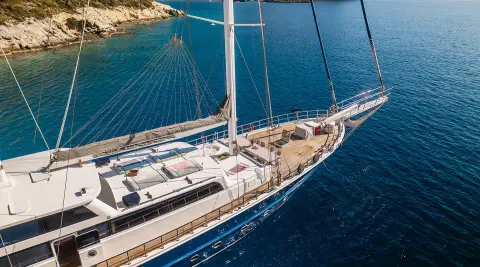 Esma Sultan gulet sun deck with sun loungers and rigging