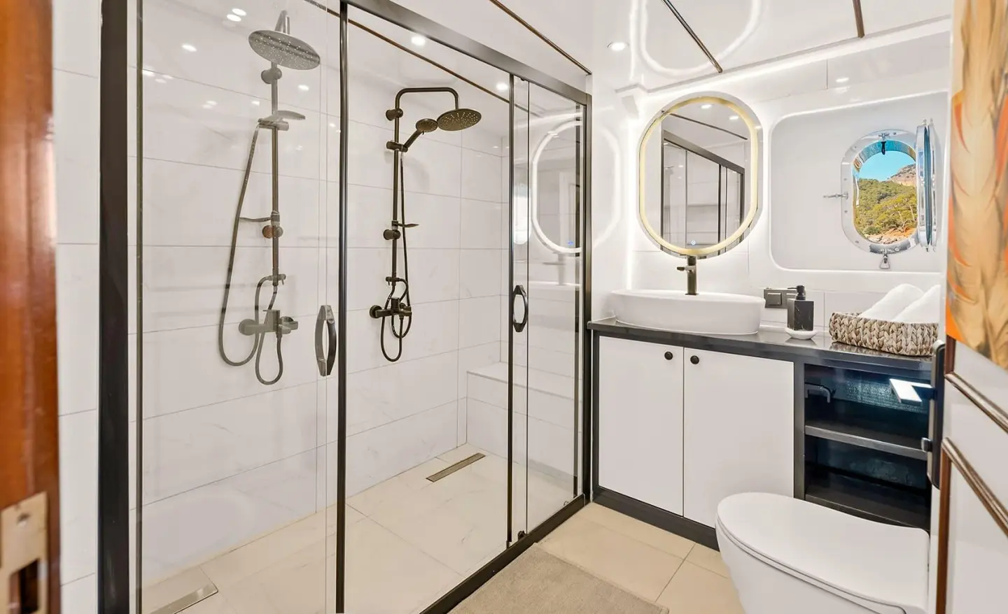 Esma Sultan yacht interior with glass shower enclosure and white fixtures