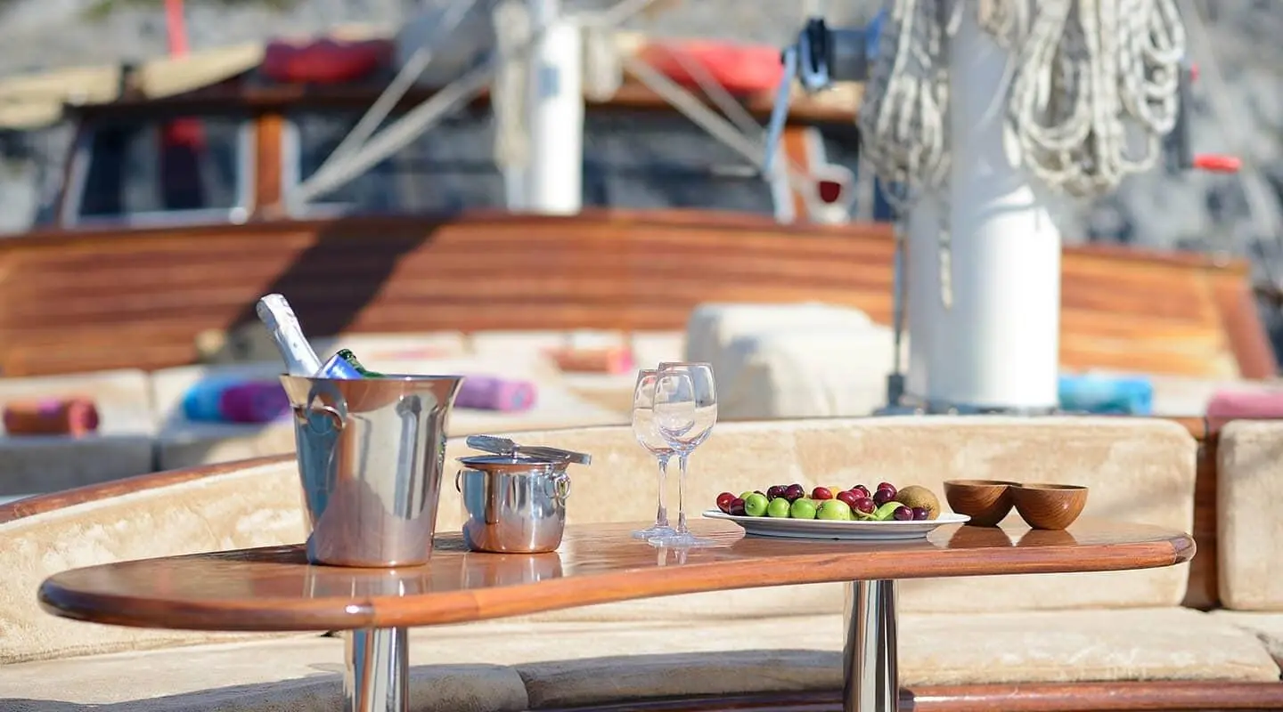 Wine tasting setup on Zephyria II gulet deck with glasses and bowls