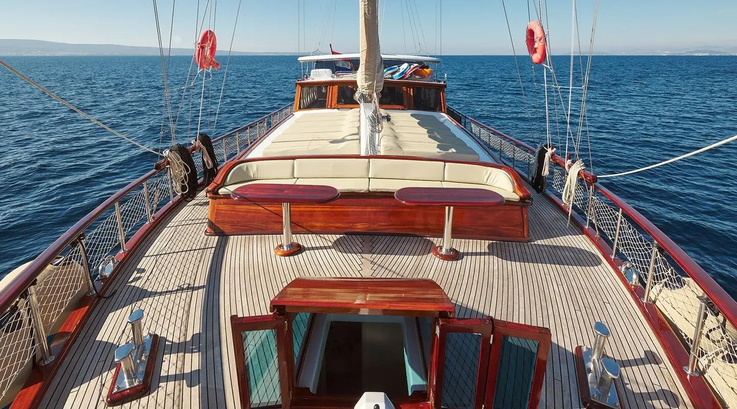 Foredeck seating area on a yacht with open sea