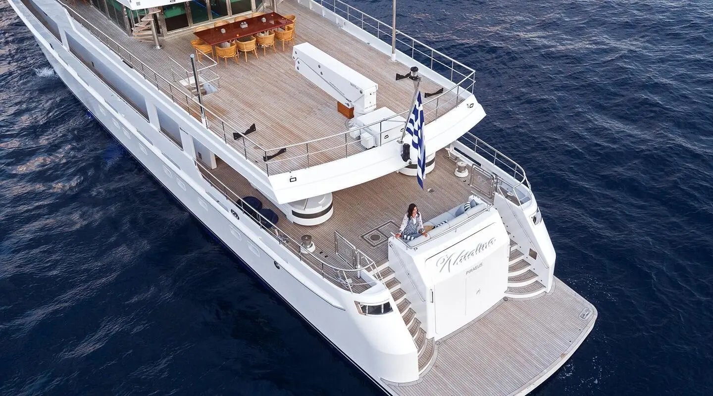 O'Natalina yacht seen from above, white hull, open deck, aft seating