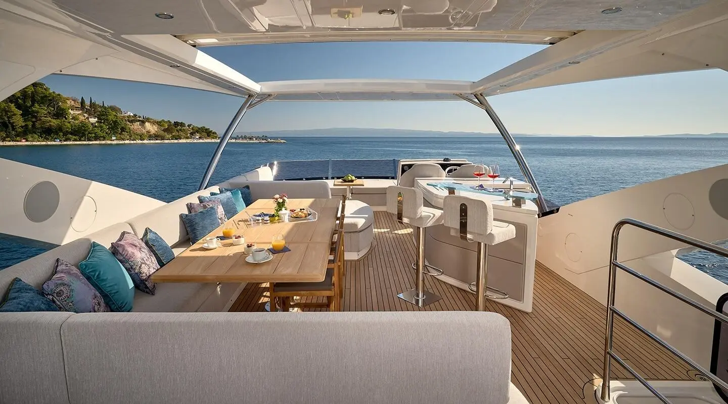 Hideaway yacht flybridge seating area and helm view