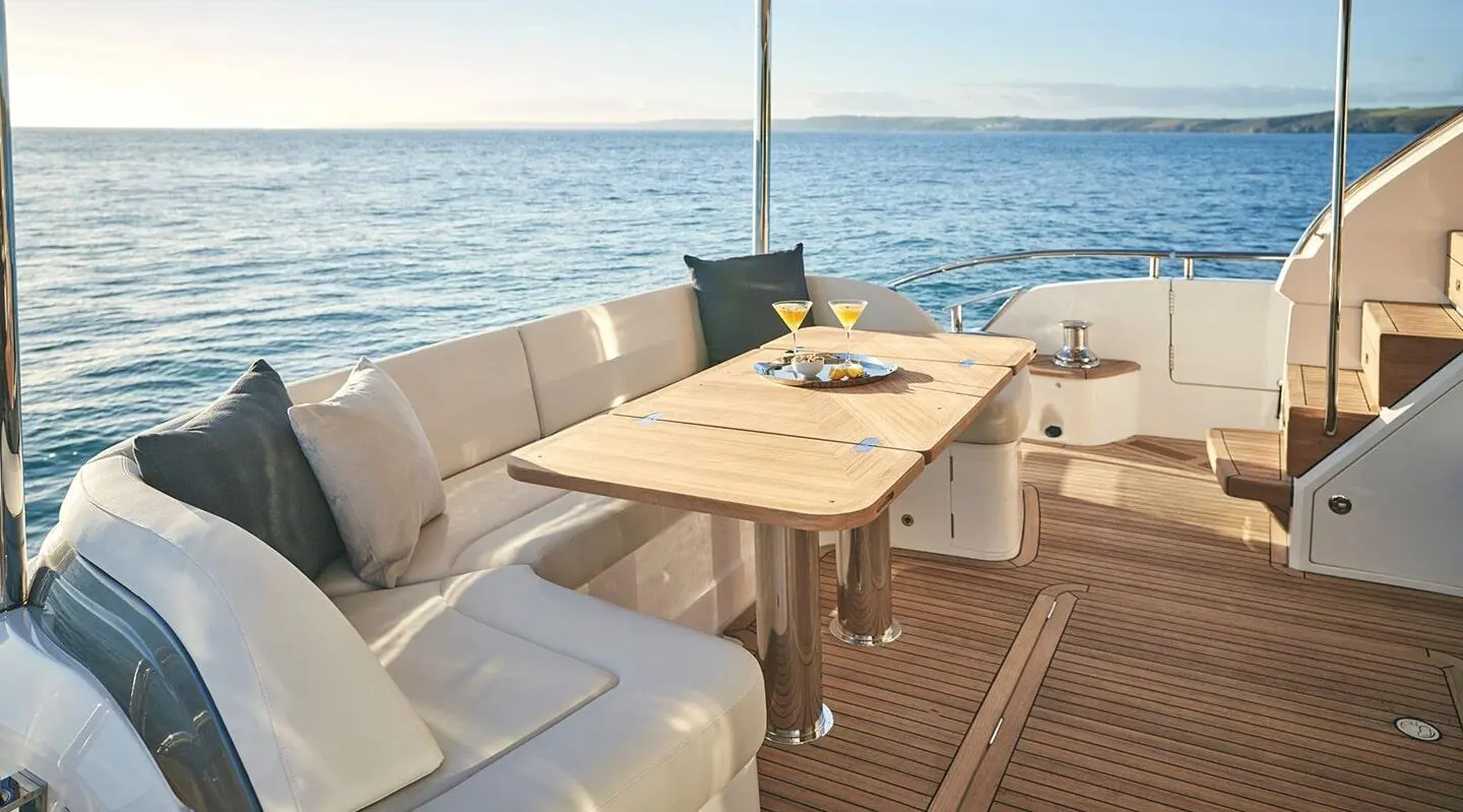 Yacht Elizabeth aft deck with seating, table, and ocean view