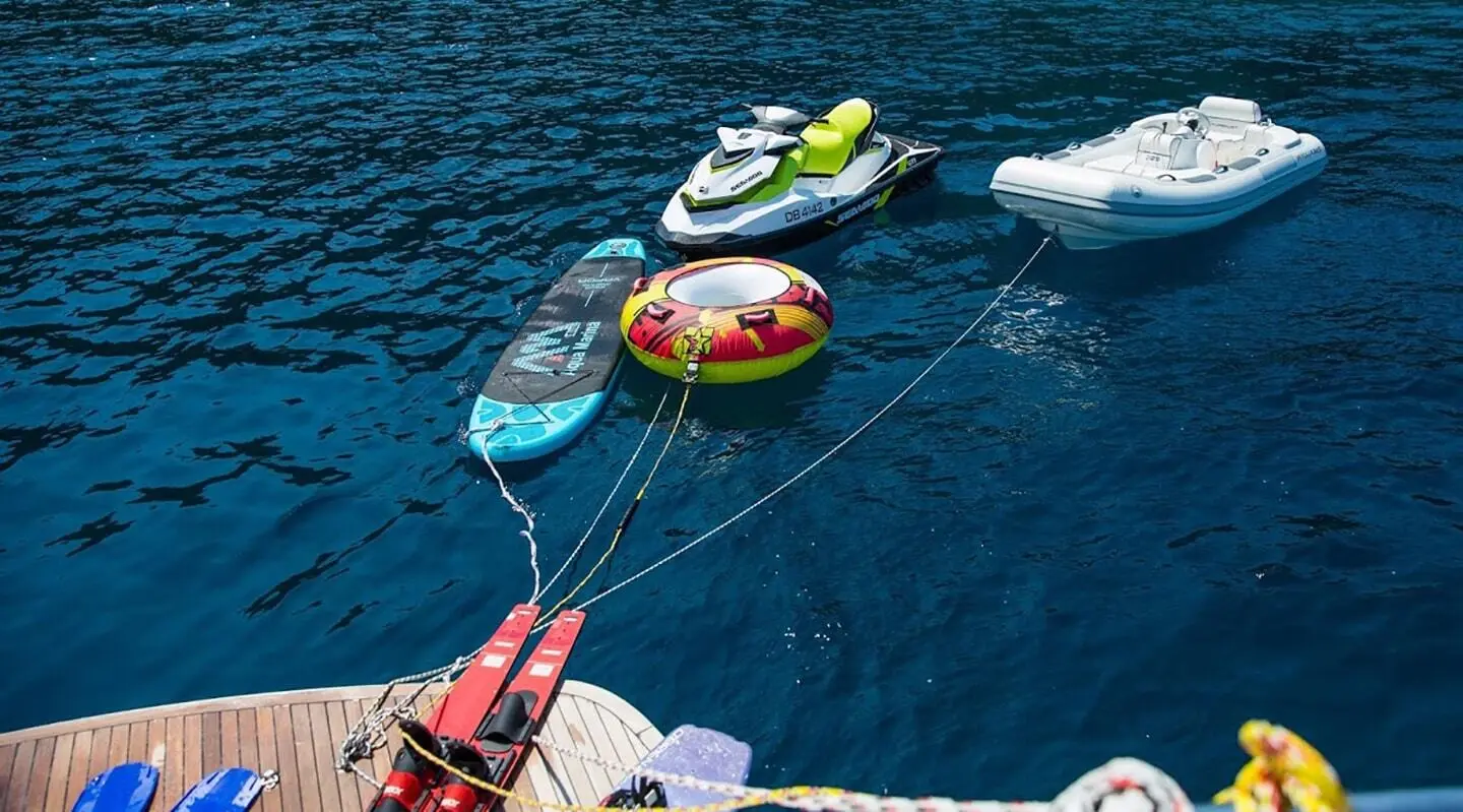 Boats anchored near a yacht Salt, view from above on blue water