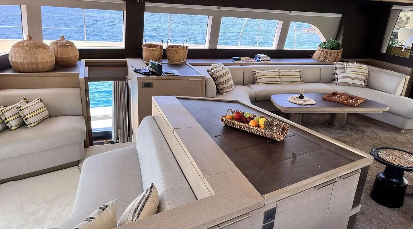 Just Marie 2 yacht saloon with seating, table, and panoramic windows