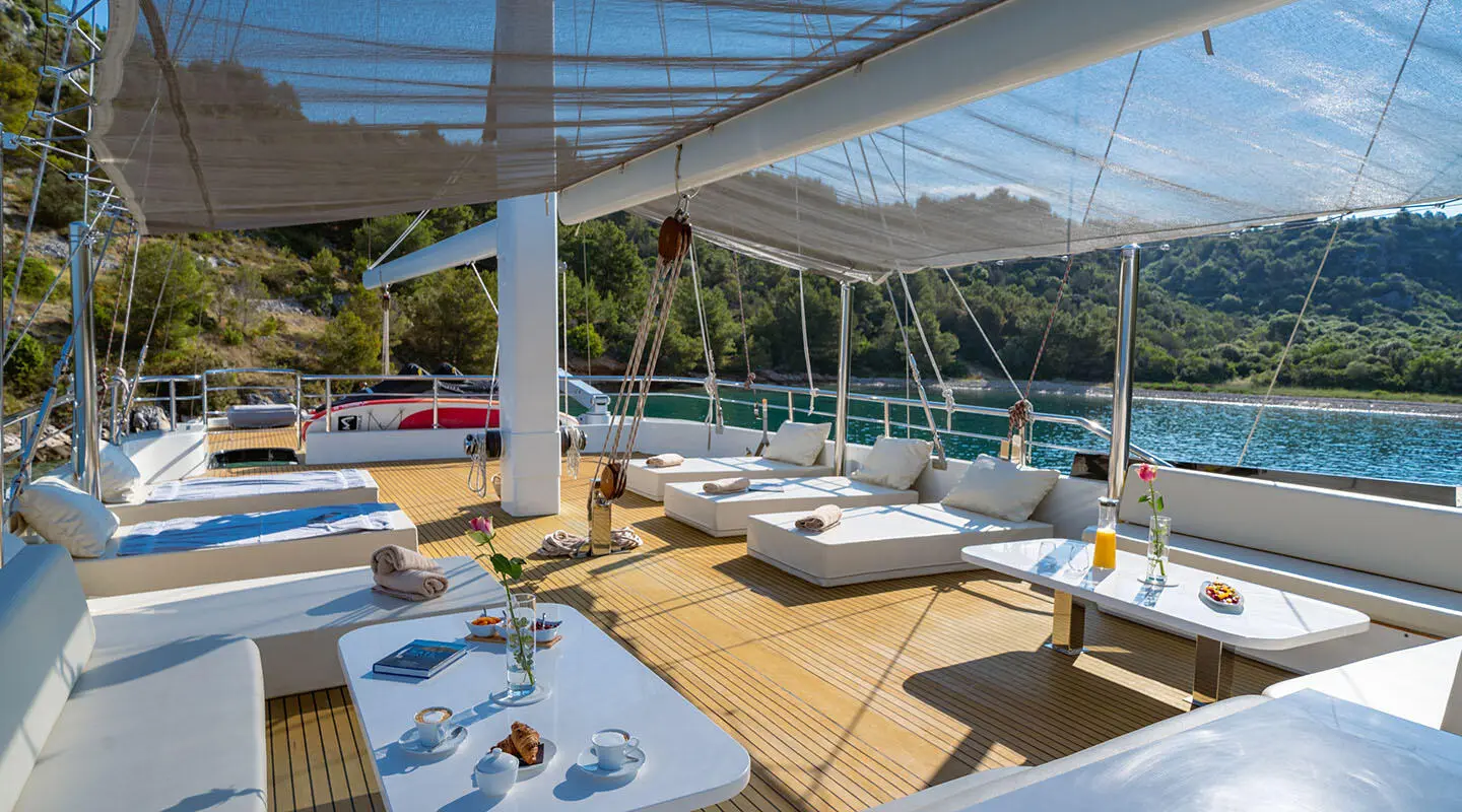 Navilux motor yacht sun deck with lounge chairs and sea view