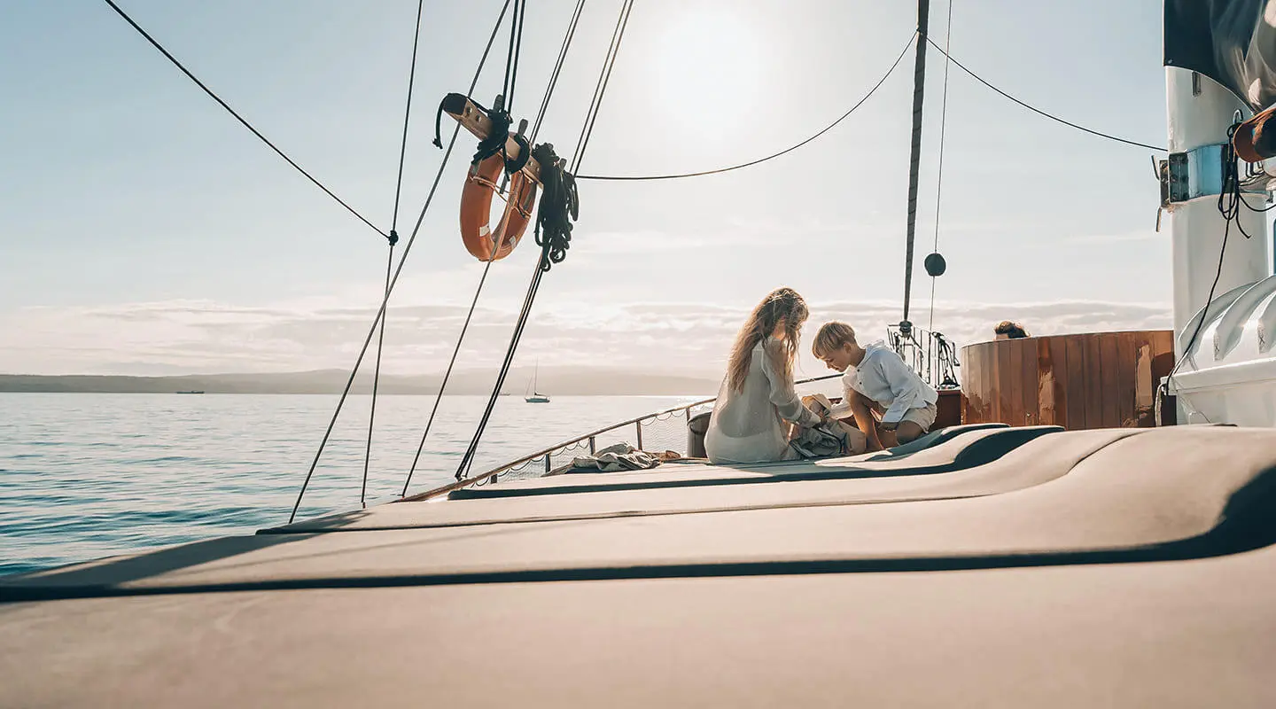 Gulet Croatia sun deck with a few passengers seated together
