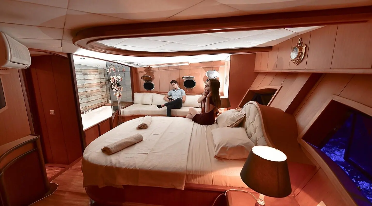 Interior of Blu Dream gulet with a circular seating area and cushions
