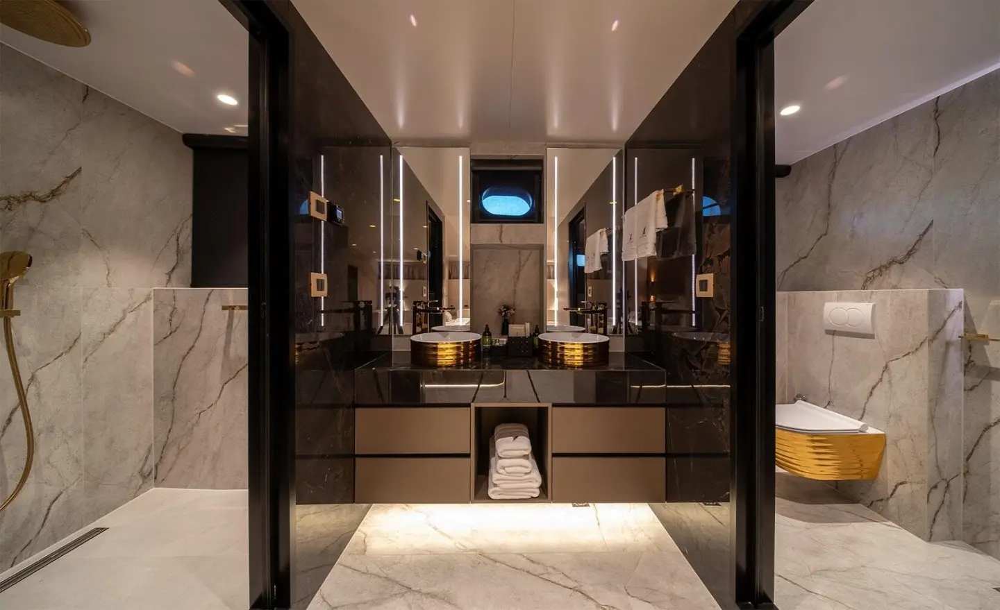 Nocturno yacht interior bathroom vanity with sink and mirror