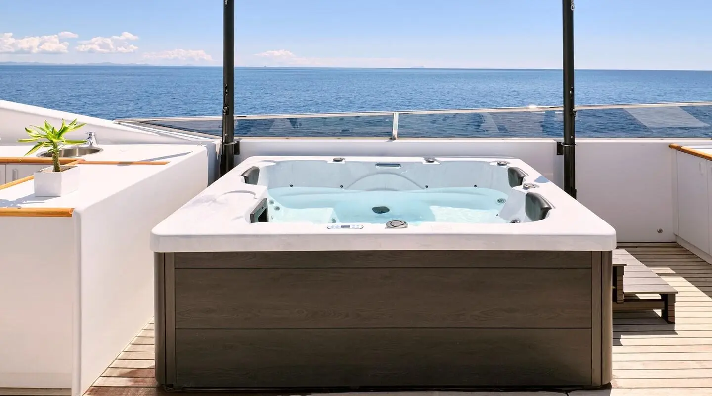 Mobius luxury yacht hot tub on deck with sea view