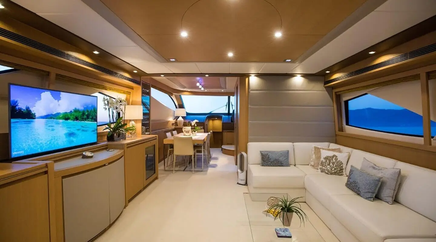 Interior of Salt yacht saloon with seating, wood accents, and soft lighting