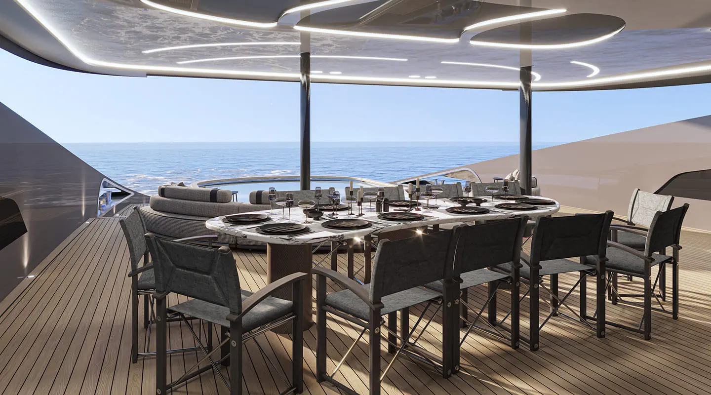 Bello yacht dining area at sunset with tables set on deck and ocean views