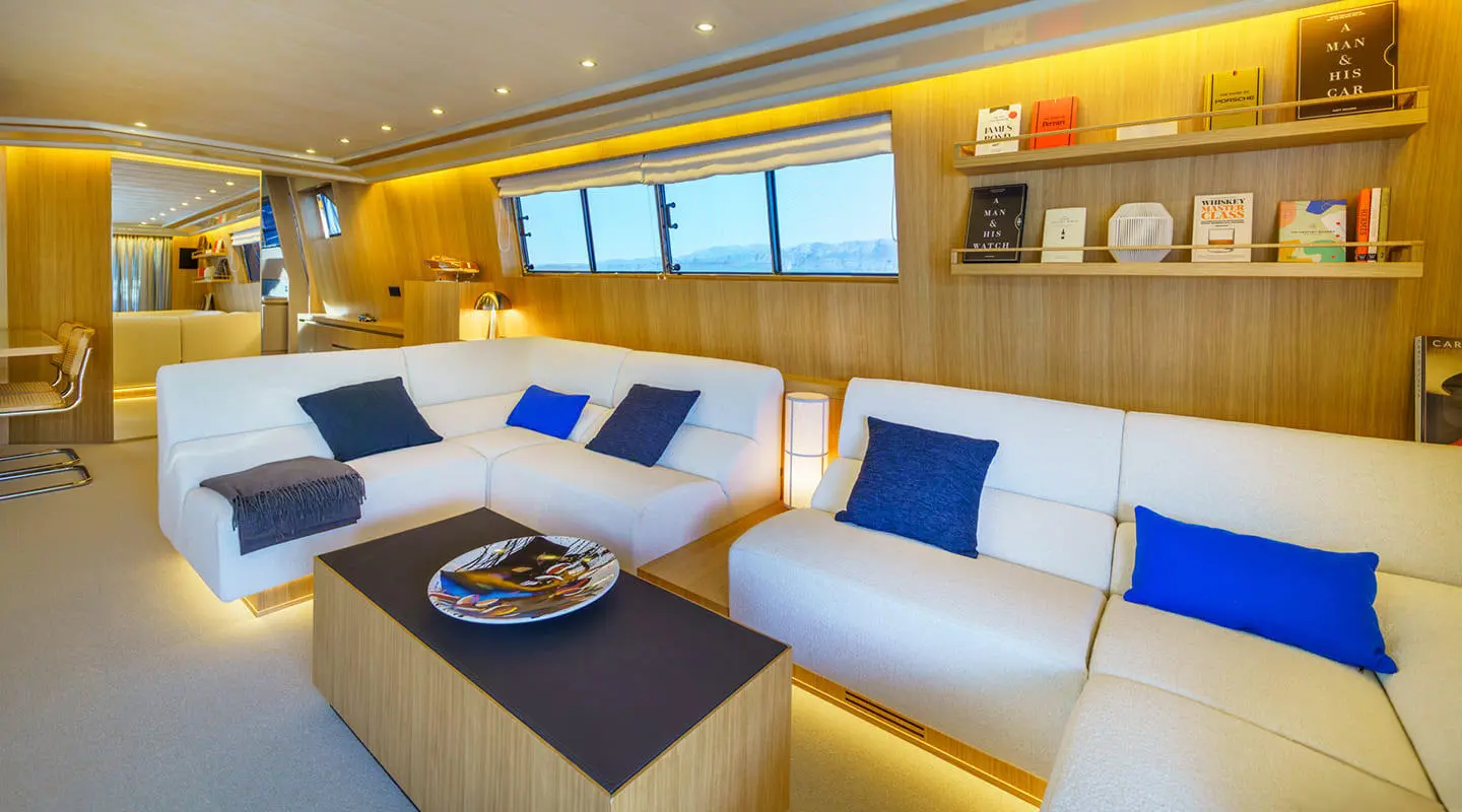 Phantom motor yacht saloon interior with white seating and blue cushions