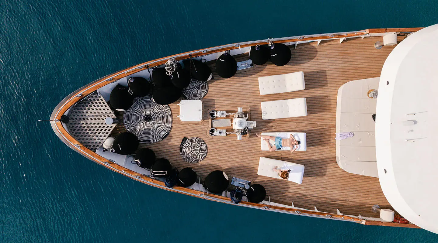Top-down view of Cristal yacht bow deck with seating and sun loungers